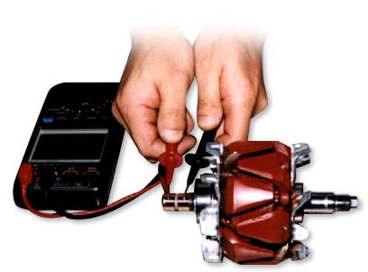 A close-up of a hand holding a red and black device Description automatically generated