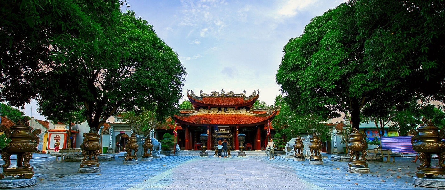 A building with trees in the background AI-generated content may be incorrect.