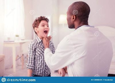 Cute Young Boy Standing in Front of the Doctor Stock Photo - Image of room, disease: 130950434